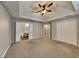 Large main bedroom with a trey ceiling, carpet and ensuite bathroom at 250 Whisperwood Nw Ln, Marietta, GA 30064