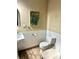 Bathroom with toilet, tile floors and a wall hanging at 3112 Laura Ln, Lithia Springs, GA 30122