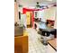 Well-lit kitchen featuring a breakfast bar and white cabinetry at 3112 Laura Ln, Lithia Springs, GA 30122