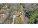 Aerial view of property showing the home's location in a wooded neighborhood at 3461 Valley View Dr, Marietta, GA 30068