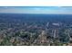 A high altitude aerial view of the home showing location relative to the city skyline at 3461 Valley View Dr, Marietta, GA 30068