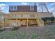 Exterior of the home highlighting the deck with a stairway leading to the backyard at 3461 Valley View Dr, Marietta, GA 30068