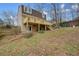 View of the backyard showcasing a spacious deck, patio and stairs to the yard at 3461 Valley View Dr, Marietta, GA 30068