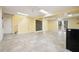 Spacious basement with a tiled floor, neutral paint, and access to the exterior at 3461 Valley View Dr, Marietta, GA 30068