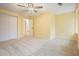 Bedroom featuring neutral carpet, neutral paint, ceiling fan, and a closet at 3461 Valley View Dr, Marietta, GA 30068