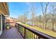 Deck overlooking the river with mature trees and blue skies at 3994 Columns Dr, Marietta, GA 30067