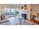 Cozy living room with fireplace and sliding doors leading to the deck at 3994 Columns Dr, Marietta, GA 30067