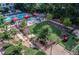 Aerial view of community amenities, including a pool, playground, and outdoor lounge areas at 795 Hammond Dr # 709, Atlanta, GA 30328