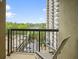 Balcony with a view of a parking garage and a condo building at 795 Hammond Dr # 709, Atlanta, GA 30328