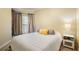 Cozy bedroom with a large bed, ceiling fan, and soft neutral colors at 795 Hammond Dr # 709, Atlanta, GA 30328