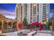 Luxury apartment building featuring outdoor lounge with fire pit and covered seating areas at 795 Hammond Dr # 709, Atlanta, GA 30328