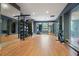 Modern fitness center equipped with punching bags, free weights, and rock climbing wall at 795 Hammond Dr # 709, Atlanta, GA 30328