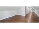 Finished attic space featuring hardwood floors and neutral paint at 8900 River Trace Dr, Johns Creek, GA 30097