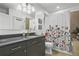 Updated bathroom with a granite countertop, and decorative shower curtain at 44 Peachtree Ne Pl # 1225, Atlanta, GA 30309