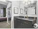 Bathroom featuring granite counters, updated fixtures and shower/tub combination at 44 Peachtree Ne Pl # 1225, Atlanta, GA 30309