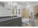 Modern bathroom with a granite countertop, and decorative shower curtain at 44 Peachtree Ne Pl # 1225, Atlanta, GA 30309