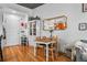Inviting entryway and dining area with hardwood floors and modern decor at 44 Peachtree Ne Pl # 1225, Atlanta, GA 30309