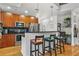 Well-appointed kitchen with sleek stainless steel appliances, breakfast bar, and stylish cabinetry at 44 Peachtree Ne Pl # 1225, Atlanta, GA 30309