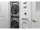 Well-organized laundry closet equipped with smart thermostat and shelving at 44 Peachtree Ne Pl # 1225, Atlanta, GA 30309