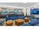 Contemporary lounge area with comfortable seating, stylish decor, and ample natural light from large windows at 44 Peachtree Ne Pl # 1225, Atlanta, GA 30309