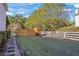 Private backyard with a wooden fence, offering a peaceful outdoor space at 2316 Watson Fain Trl, Loganville, GA 30052