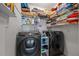 Efficient laundry room featuring Samsung washer and dryer and shelving at 2316 Watson Fain Trl, Loganville, GA 30052