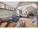 Spacious main bedroom with sitting area, perfect for relaxation and unwinding at 2316 Watson Fain Trl, Loganville, GA 30052