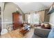 Cozy sitting area featuring hardwood floors and light-filled windows at 2316 Watson Fain Trl, Loganville, GA 30052