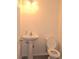 Cozy half-bath with pedestal sink and neutral color scheme at 2969 Wynhaven Oaks Way, Lawrenceville, GA 30042