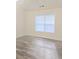 Bedroom with neutral walls and a window letting in natural light at 2969 Wynhaven Oaks Way, Lawrenceville, GA 30042