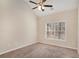 Vaulted bedroom with carpet and a window at 30 Sampson Ct, Covington, GA 30016