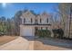 Charming two-story home featuring a well-maintained lawn and attached garage at 30 Sampson Ct, Covington, GA 30016