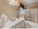 Bathroom featuring a tile countertop, shower, and tiled floors at 3439 Elm Creek Nw Dr, Marietta, GA 30064