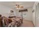 Cozy bedroom features a ceiling fan and neutral carpet at 3439 Elm Creek Nw Dr, Marietta, GA 30064