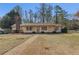 Charming single-story home with brick pathway and well-maintained landscaping at 3439 Elm Creek Nw Dr, Marietta, GA 30064