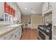 Bright kitchen with white cabinetry, laminate countertop, and newer appliances at 3439 Elm Creek Nw Dr, Marietta, GA 30064