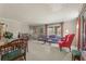 Open-concept living room and dining area with large windows providing natural light at 3439 Elm Creek Nw Dr, Marietta, GA 30064