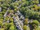 Aerial view of a residential neighborhood featuring tree-lined streets at 52 Ivy Chase Ne, Atlanta, GA 30342