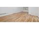 Cozy room with hardwood floors, a large window, and a white door creating a clean and simple aesthetic at 52 Ivy Chase Ne, Atlanta, GA 30342