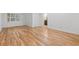 Bright bedroom with large windows allowing ample natural light and hardwood floors throughout at 52 Ivy Chase Ne, Atlanta, GA 30342