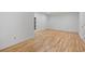 Spacious room featuring hardwood flooring and neutral walls creating a bright and inviting space at 52 Ivy Chase Ne, Atlanta, GA 30342