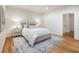 Comfortable bedroom with hardwood floors and ensuite bathroom at 52 Ivy Chase Ne, Atlanta, GA 30342