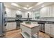 Eat-in kitchen featuring custom cabinets, stainless appliances, and butcher block island at 52 Ivy Chase Ne, Atlanta, GA 30342