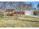 Charming brick home with a manicured lawn and a two-car garage, perfect for suburban living at 2447 Caladium Ne Dr, Atlanta, GA 30345