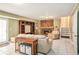 Cozy living room featuring a stone fireplace, built-in shelving, and access to the backyard at 2447 Caladium Ne Dr, Atlanta, GA 30345