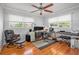 Bright office featuring hardwood floors, natural light, desk and keyboard, perfect for productivity at 2447 Caladium Ne Dr, Atlanta, GA 30345