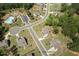 Aerial view showcases the property's location within a well-planned community with green spaces and streetscapes at 2106 Sycamore Ln, Loganville, GA 30052