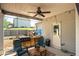 This covered patio features an outdoor kitchen area and cozy seating, perfect for enjoying outdoor living at 2106 Sycamore Ln, Loganville, GA 30052