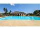 A community swimming pool, surrounded by lounge chairs, offering a great spot for relaxation and recreation at 2106 Sycamore Ln, Loganville, GA 30052