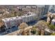 A birds-eye view shows a condo complex in a treed area close to shops and restaurants at 2255 Peachtree Ne Rd # 426, Atlanta, GA 30309